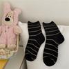 Calcetines Huhu de leche a rayas multicolor finos para rizar a media pantorrilla otoño e invierno calcetines japoneses suaves calcetines de felpa para mujer estudiante venta al por mayor