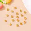 Retención de color fuerte arena dorada trébol de cuatro hojas cuentas de cobre venta al por mayor de fábrica cuentas de oro antiguo hueco hortensia accesorios DIY