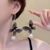 Brincos de Pérola Borboleta Elegantes Super Fada 2025 Novos Brincos Populares Brincos Pendurados de Nicho de Alta Qualidade Brincos Femininos