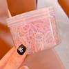 Amazon caramelo lata banda de goma cuerda para el pelo no daña el pelo banda de pelo desechable fuerte tirón constante cuerda para el pelo atar pelo al por mayor