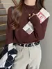 Nuevo Estilo Ropa Interior para Mujer de Cuello Alto Tejido 2026 Otoño Invierno Elegante Ropa Interior Negra Suéter de Cuello Medio Top de Invierno