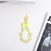 Colgante de llavero de cadena para teléfono con lazo de múltiples flores personalizado, accesorio de bolso de alta gama, amuleto de dopamina al por mayor