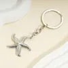 Llavero de Acero Inoxidable Chapado en Oro de 18K con Forma de Estrella de Mar de Venta Caliente Transfronteriza Colgante para Bolso Estilo Marino Europeo y Americano Dropshipping