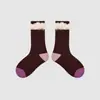 1698 Calcetines infantiles al por mayor, nuevos estilos otoño/invierno, con diseño de punto inverso y flecos, y una longitud única a media pantorrilla, hechos de algodón con un acabado sin costuras y borde crudo, para niñas