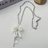 Collar largo estilo coreano inspirado en ins con perlas florales y forma de gota de agua, dulce y elegante, moderno y sofisticado, cadena para suéter de nicho para mujer