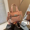 Bolsas Transparentes da Moda para Mulheres Primavera/Verão 2025 Nova Bolsa Transversal Versátil Bolsa de Mão Popular de Nicho Bolsa de Gelatina
