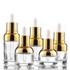 Garrafa de ombro dourado de 20 ml Garrafa de essência de garrafa líquida de 30 ml Garrafa conta-gotas de aromaterapia de 50 ml Garrafa de cosméticos