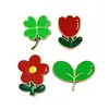 Broche Metálico Flor Roja y Hoja Verde Transfronterizo Insignia de Premiación para Actividad Escolar Insignia Decorativa para Ropa Mochila de Aleación En Stock