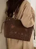 Bolso Tote Retro Versátil para Viajes Diarios para Mujer 2026 Invierno Nuevo Estilo de Gama Alta Casual Gran Capacidad Hombro Axila