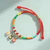 Pulseira de corda colorida zongzi do Festival do Barco-Dragão 2026 novo modelo pulseira trançada artesanal étnica infantil atacado corda vermelha