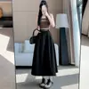 Foto real de falda plisada de algodón lavado para mujer, nuevo modelo otoño 2026, que cubre la cadera, adelgazante, línea A, longitud media, falda de paraguas con dobladillo ancho