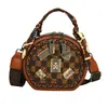 Bolso Redondo Pequeño de Moda de Gama Alta para Dama 2026 Nuevo Bolso de Mano con Estampado Retro Bolso Cruzado de Hombro Único Versátil Casual