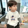 Camiseta de manga larga de dos piezas de imitación para niños, nuevo modelo de principios de otoño 2026, top de algodón puro para primavera y otoño, camiseta interior para niños mayores