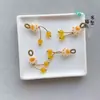 Precio mayorista directo de fábrica pulsera hecha a mano pulsera con colgante diy accesorios pequeños deslizantes colgante de garra de gato lindo Joker