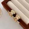 Pendientes de Flor de Metal Sencillos de Moda Retro con Cierre de Aguja de Plata S925 para Mujer, Diseño de Lujo Accesible de Nicho
