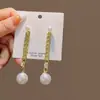 Brincos de Pérola Coreanos de Alta Qualidade 2026, Agulha de Prata Estilo Vintage Chanel Diamante Colorido Estrela de Oito Pontas Brincos de Tarraxa Atacado