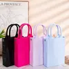 Bolso de mano mini a cuadros fresco para mujer, bolso vertical brillante para teléfono, bolso tipo cesta simple, único y moderno