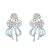 Pendientes de botón con lazo estilo medieval vintage y circonita, delicados y elegantes, con un toque de alta gama, adecuados para el uso diario.
