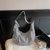Bolso de Cuadros Versátil Tipo Dumpling de Otoño e Invierno Dongdaemun Corea del Sur 2025 Nuevo Moda Ligero para Viajes Diarios con Cierre de Cordón Cruzado