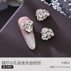 Manicura pila caja de regalo de joyería de diamantes con garra aleación diamante amor rojo intermitente Año Nuevo uña metal accesorios de diamantes