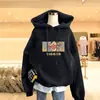 Marca da Moda Tigger 2025 Outono e Inverno Novo Moletom Fino com Capuz Feminino Solto com Efeito Emagrecedor Estilo Coreano Jaqueta de Primavera e Outono Casual
