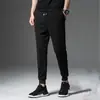 Calças de Seda de Gelo Casuais Masculinas Primavera e Verão Finas Secagem Rápida Elásticas Largas de Perna Reta Calças Esportivas Calças Masculinas plus size Calças Masculinas
