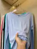 Camisa de Proteção Solar Colorida com Gola Redonda, Emagrecedora, Versátil, Moderna, Cor Sólida, Casual, Caimento Solto, Manga Longa para Ar Condicionado, Camiseta Fina para Mulheres