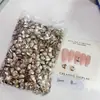 Pacote Completo de Acessórios para Nail Art de Fundo Pontiagudo Atacado, Strass Quadrados Brilhantes Grandes e Pequenos na Cor Champagne Formato de Ovo de Pombo para Decoração de Nail Art