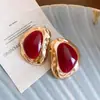 Pendientes geométricos irregulares de resina con aguja de plata transfronterizos europeos y americanos, pendientes de diseño nicho, accesorios elegantes de lujo ligero de alta gama
