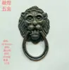 Manija de cabeza de león antigua característica grifo de aleación caja de vino manija pequeña puerta de casa grande tira de puerta dorada estuche de cuero Té