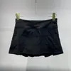 Nova Saia Versátil de Cor Sólida Modelo A Primavera/Verão 2026 Saia Média Casual Leggings Esportivos Saia Curta Anti-Exposição para Mulheres