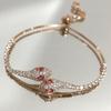 Pulsera Europea y Americana Nueva Micro-incrustada Zirconia Ojo Verde Serpiente Lujo Ligero Sentido del Diseño Nicho Exquisita Moda Pulsera Ajustable