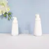 En stock botella cónica blanca de espuma de 60 ml, botella espumadora de PET para mousse de 100 ml, dispensador portátil de espuma facial