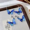 Pendientes de Perla con Mariposa en Gradiente Azul de Moda Aguja de Plata para Mujer, Estilo de Nicho de Lujo Ligero, Ganchos Elegantes, Pendientes de Moda de Gama Alta