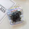 Lindo set de goma para el cabello de colores gruesas y desechables para bebés, empaquetado en bolsa de dibujos animados, que no dañan el cabello, directo del fabricante
