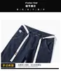 Roupas Masculinas Fengshe / 2026 Primavera e Outono Calça Jeans Básica Masculina Levemente Larga Slim Fit Casual Detalhe de Bolso Cordão na Cintura Tendência