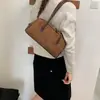 Colgante gamuza otoño conejo hombro axila nuevo 2026 bolso de mano, moderno retro exquisito bolso coreano para mujer