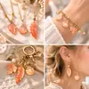 Paquete de materiales para accesorios de pendientes DIY, accesorio para el cabello de estilo antiguo, colgante de hoja con efecto plateado de color, acrílico naranja aleatorio de 50g