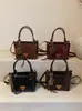 Nuevo Bolso Pequeño Retro de Alta Gama para Mujer Otoño e Invierno 2025, Nuevo Bolso Cruzado Versátil, Bolso Cubo de Mano Súper Popular
