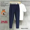 Pantalones profesionales para negocios, pantalones ajustados de moda estilo Hong Kong, ropa casual de hombre de alta gama sin planchado a la moda 2026