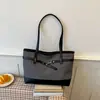 Bolso tote monograma vintage aprobado por influencers con correa decorativa de cuero, simple y versátil para viajes y almacenamiento