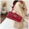 Bolsa baguette dulce de lunares brillante texturizada 2026 para mujer, bolso tote cilíndrico retro, bolso de hombro versátil