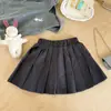Conjunto de Verano de Moda para Niñas Nuevo Estilo Sudadera a Rayas Chaleco sin Mangas Falda Corta Plisada Conjunto de Dos Piezas