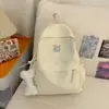 Nova mochila escolar de alta qualidade transfronteiriça para alunas do ensino médio, estilo universitário, cor sólida, grande capacidade, simples e versátil