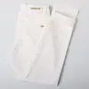 Jeans Blancos Ajustados de Lujo Ligero Estilo Europeo de Alta Gama de Hong Kong, Nuevos Pantalones Versátiles de Negocios para Primavera y Otoño