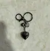 Llavero con forma de corazón de diamantes con incrustaciones de tamaño simple, accesorio creativo para colgar en bolsos, estilo transfronterizo europeo y americano