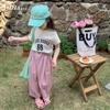 Camiseta de Verano para Niña 2024 Nueva Elegante Moderna de Manga Media con Cuello Redondo y Estampado para Niños, Linda de Manga Corta