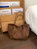 Bolso transfronterizo simple retro de gran capacidad 2026 nuevo bolso de hombro de moda para mujer estudiante universitario bolsa de mano