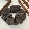 Versión coreana de otoño e invierno vintage franela onda punto anillo para el cabello de intestino grueso moda femenina combinable cuerda para el cabello temperamento goma elástica bola cuerda para el cabello