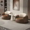 Mesa y sillas de negociación modernas de lujo ligero para sala de estar, balcón, dormitorio, salón de belleza, tienda de ropa, silla individual de cuero con diseño de garra de gato
